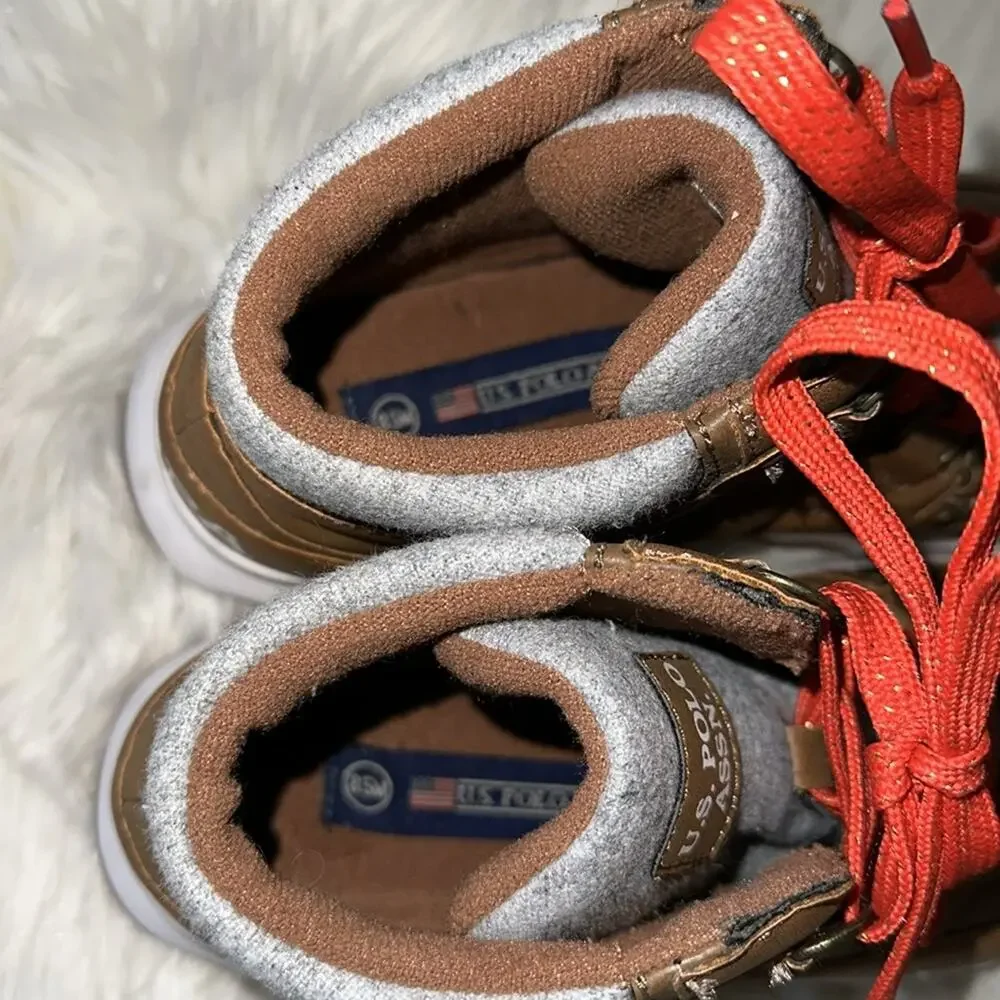 U.S. Polo Assn. or boots hardly